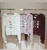 Tricots de tricots de masse de style mine japonais Sweet Bow Trickitwear Automne hiver femelle à manches longues mono-ponts cardigan
