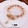 Nouveau style chinois véritable or électroplate de fraise bracelet zircon chinois-chiche de chaîne polyvalente petit nombre de bijoux de main de haute qualité