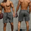 Shorts de course à sec rapide hommes Vêtements sportifs solides Fitness Bodybuilding pantalon court sport homme gym d'entraînement plage mâle 240409