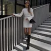 Robes décontractées élégants mini-robe en tricot sexy pour femmes 2024 automne à manches longues minces minces pull blanc