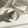 Café de niche de style japonais Simple Blue Letter Cerramic Mug and Saucer Set French rétro Retro Romantic Coffee Cup Milk Cup