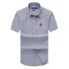 Designer Mens Polos Shirts à manches courtes TEE CONCUTER PRINT Coton Business CE Shirts Casual Tops Vêtements Tissu Fabric Polo