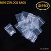 100 pcs en plastique transparent mini-ziplock Sacs de bijoux petites plus épaisses pochettes d'emballage en cristal plus réutilisables Sack de verrouillage à fermeture éclair pochette réutilisable