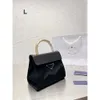 ハンドバッグデザイナーホットブランドの女性バッグの50％割引PSナイロンキャンバスクロスリングポータブル小さな正方形のバッグ