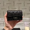 Designer feminino Black Classic Mini Flap Solded Lampskin Caviar Card de couro Tiny Bags Bolsa de Luza de Mertilha de Diamante 8cm