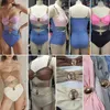 Costumi da bagno femminile Donne monokini costume da bagno eleganti costumi da bagno monopezzo sexy con decorazione a bottone in metallo taglio di controllo della pancia