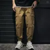 Pantaloni da uomo carico in alla moda versione coreana dritta della funzione di tendenza sciolta e casual femminile