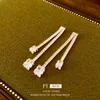 Sier Needle Circon Tassel cuadrado versátil, elegante, elegante y de alto grado, populares en Internet, nuevos pendientes de moda para mujeres