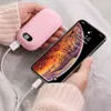 10000mAh 5V/2A USB قابلة لإعادة الشحن يدوية دافئة بنك الطاقة الأنيقة المحمولة المحمولة للهدايا والرياضة في الهواء الطلق