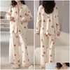 Vêtements de sommeil pour femmes longues à manches à manches longues à manches à manches longues pyjama d'hiver à poitrine de dessin confortable avec la taille élastique du cou en V