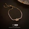 Echtes gold elektropliertes Zirkonknoten Geometrisches Armband aus Südkorea, leichtes, süßes modisches Armband, Nischendesign und Gefühl für Frauen