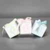 10pcs / lot des pieds de bébé forme de mariage Boîte de bonbons de mariage Mariage Charme Favoule Faveur de bonbons Boîtes de mariage Gift Hold Sac avec ruban