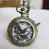 Pocket Watches Retro Quartz Hunger Games Popular Hollow Mockingbird Design Pocket de bronce Y240410