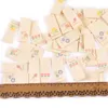 50Pcs/Lot 1.6x3.8cm Flower Beige Labels For Sewing Supplies Care Bags Clothes Tag Garment Handmade Accessories DIY Crafts C2887