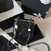 Designer Crossbody Bag axelväskor Sling Satchel för kvinnokedja med hjärtformad hänge och bollsmakeup Luxurys handväskor 11*9*8cm