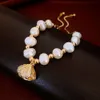 Real Gold Electroplated Zircon's Eye Stone Pearl Niche Light, Bracelet de sensation haut de gamme, bracelet polyvalent