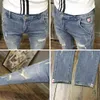 Jeans en détresse, poches de diagonale finement fine des hommes pour hommes, pantalon slim fit petit, version coréenne pantalon randonnée à la mode