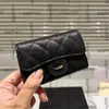 Designer feminino Black Classic Mini Flap Solded Lampskin Caviar Card de couro Tiny Bags Bolsa de Luza de Mertilha de Diamante 8cm