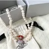 Designer Viviane Westwood Empress Dowager Magnet Buckle Enamel Pearl Necklace Womens Net Red Spice Saturn Pearl Clavicle Chain Three Colors