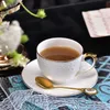 Tasse à café blanc ensemble de soucoupe européenne de luxe de luxe Chine à thé fleur tas tasse tasse de gasse de collation à la maison à la maison exquise