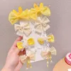 Clip accessoires de cheveux pour les enfants 8pcs / ensemble beaux clips de fleur Barrets de la journée pour enfants Cadeau de Noël