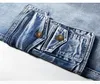 Jeans masculin cargaison courte d'été avec des poches multiples shorts en jean slim pour mâle de travail tactique bleu lavé mâle