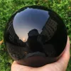 Grande sphère d'obsidienne noire naturelle grande pierre de guérison de la boule de cristal