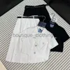 Jupe de créateurs de robes à deux pièces 2024 Nouvelle ceinture de boucle Cold Cold Flip Top courte + jupe plissée Ensemble jupe en deux pièces