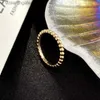 Anéis de designer de marca de alta ponta para mulheres de alta versão alta pérola anel feminino 18k Gold rosa CNC esculpido em camadas sênior Jóias de designer de logotipo