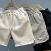 Mentes de natation des shorts pour hommes pour hommes de bain d'été pantalon à cordon de sport avec poches de surf plage