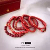 Neues chinesisches Stil Lucky Koi Vermilion Perle Elastic Armband, kleine minimalistische, modische und vielseitige Handwäsche für Frauen