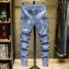 Jeans maschile primavera e autunno classico coreano classico harajuku Street wear lussy slaiod slim jeans pantaloni