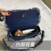 Nouveau créateur denim tassel di sac cowboy épaule crossbody sac mode sacs de main femmes baguette luxe fourre-tout