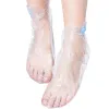 100pcs/حزمة الأقدام البلاستيكية التي يمكن التخلص منها تغطي أحذية شفافة تغطية البارافين حمام الشمع أكياس علاج الجوارب بطانة الجوارب
