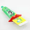 2pcs Lip Toothasty Squeezer Plástico Plástico Pasta de dente Distribuidor de tubo Crega de dente Rolando Suporte para o banheiro Home Supplies