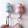 Ganci 1pcs creativo borse fortunato gancio forte adhesivi grade pugno grazioso tastiera appiccicoso appendiabiti dietro la porta