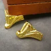 4pcs Golden Leg Corner Protecteur Boîte cadeau décoratif Pieds Bois Case de bois à quatre pattes Foot Foot Foot Meuble