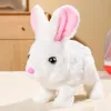 Ensemble en peluche de jouet de lapin en peluche avec un déménagement de marche comprend une poupée pour animaux de compagnie de lapin blanc à batterie pour filles 240401