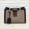 498156 Mizaç asma kilit koleksiyonu omuz çantası 2 Boyutlar 26cm 35cm Siyah Beyaz Turuncu Kadın Moda Messenger Packag Tuval Genu2538