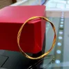 Gesloten Mobius ring vergulde armband Een jonge minimalistische modieuze en veelzijdige onregelmatige lijnarmband