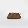 Axige's same cowhide women's bag cloud bag One Shoulder Messenger Bag fold hand bag soft skin dumpling bag