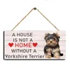 Une maison n'est pas une maison sans un ou panneau de chien yorkshire