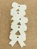 Scrapbooking fai -da -te a forma di bowknot che creano etichette Kraft Blank Hang Card Craftes Regalo per matrimoni Etichetta Etichetta