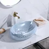 Nouveaux lavabos de salle de bain peints à la main chinois bassin de comptoir art bassin de salle de bain domestique personnalité créative de lavabo en céramique