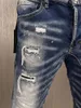 Jeans pour hommes décontractés Motobiker High Street Denim Fabric Pantalon Fashion Hole Spray Paint A610