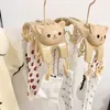 Pianto di asciugatura di abiti da gatto carino con gatti con 10 pezzi di vestiti pioli per la lavanderia esterna ganci per vestiti bianche