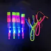 LED Flying Toys 1PC LED Flying Toys Outdoor Shining Rocket Flashing Light Slingshot Elastyczne helikopter obracający latające dzieci zabawki świąteczne 240410