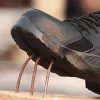 Stivali uomini lavorano stivali per scarpe di sicurezza 2023 Nuove sneaker antishashing scarpe indistruttibili stivali da lavoro a prova di foratura con cappuccio di punta in acciaio