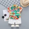 Magliette per bambini abiti da spiaggia set da bambino per bambini estate cotone floreale camicia a maniche corte + pantaloncini 2pcs 2pcs Outfit hawaiano 240410