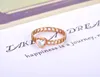 Pierścionki ślubne Jeemango Trendy Titanium ze stali nierdzewnej Cz Crystal Love Heart Pierścień Rose Gold Kolor dla kobiet dziewczyna Jr20064
